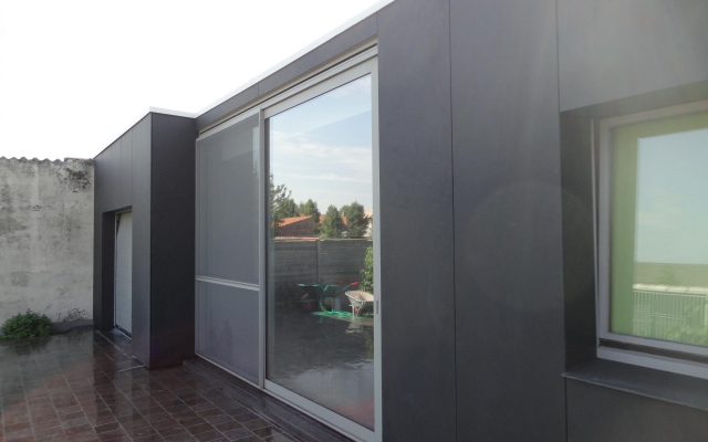 Eternit gevelbekleding verlijmd in Gistel
